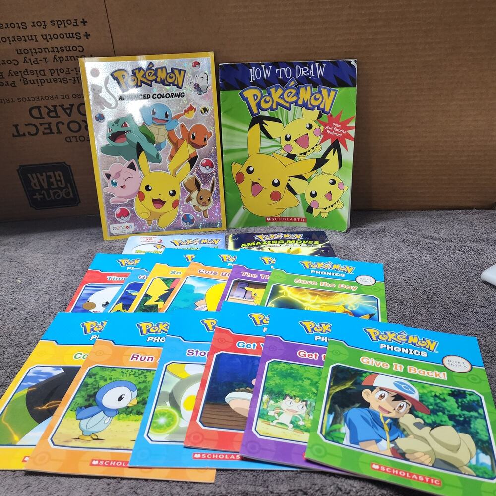 Various Pokemon Books some of the activity books have been used b49